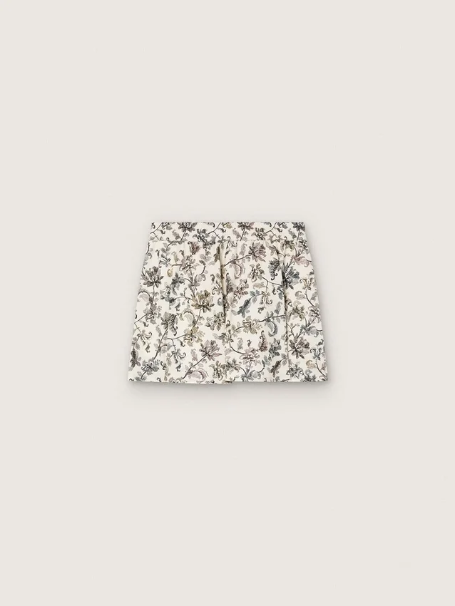 Journey-Minirock für Mädchen aus weissem Baumwoll-Canvas mit grünem Blumenprint