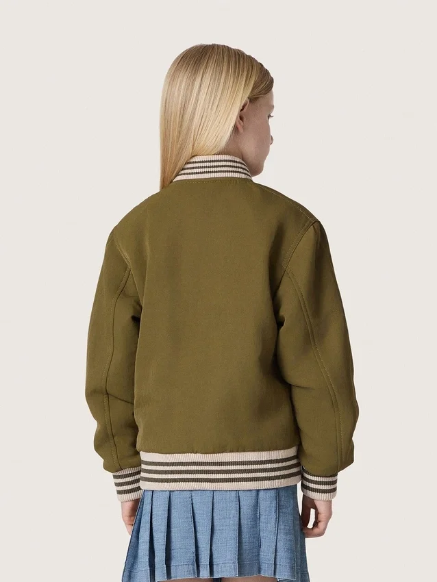 Journey Unisex-Bomberjacke aus militärgrünem Nylon-Twill mit gesticktem Aufnäher