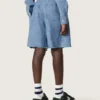 Journey Unisex-Shorts aus hellblauem Baumwoll-Chambray mit gesticktem Logo
