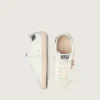 Junior Super-Star mit goldenem Glitzerstern und silberner Metallic-Lederlasche am Absatz