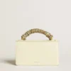 Kleine Venezia-Tasche aus butterfarbenem, geripptem Leder mit geflochtenem Band