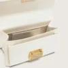 Kleine Venezia-Tasche aus butterfarbenem, geripptem Leder mit goldenen Details