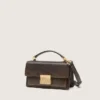 Kleine Venezia-Tasche aus dunkelbraunem Leder mit goldener Schnalle