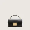 Kleine Venezia-Tasche aus schwarzem Leder im Used-Look mit goldenen Details