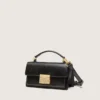 Kleine Venezia-Tasche aus schwarzem Leder im Used-Look mit goldenen Details