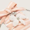 «Lederwaren»-Schnürsenkel in Weiss und Rosa gestreift mit Perlen- und Kristallanhängern