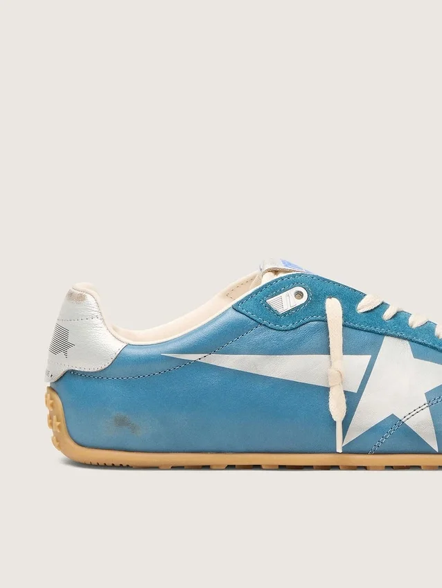 Herren-Marathon Speed aus blauem Nappa mit aufgedrucktem Stern und silberner Fersenlasche aus Leder