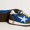 Marathon Young aus blauem Nylon mit aufgedrucktem Stern und Lederlasche an der Ferse