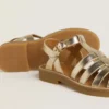 Maxime Junior-Sandalen aus goldenem Leder