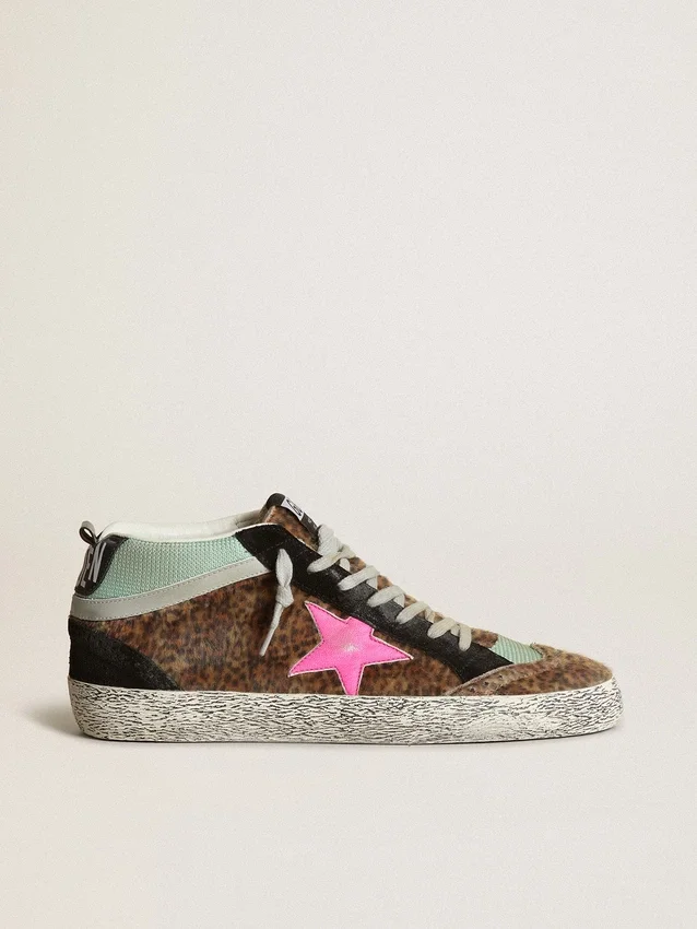 Mid Star aus Ponyfell mit Leopardenmuster und fuchsiafarbenem Lederstern