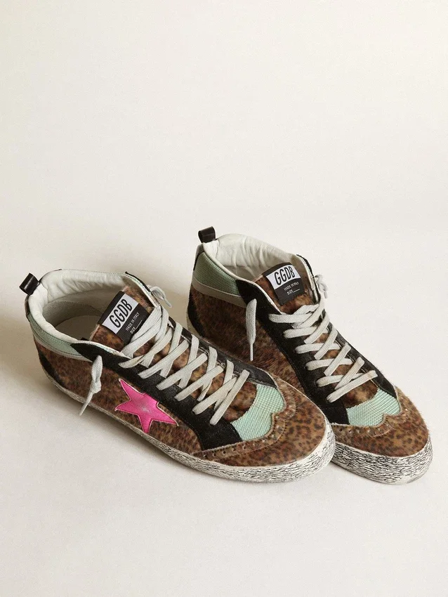 Mid Star aus Ponyfell mit Leopardenmuster und fuchsiafarbenem Lederstern