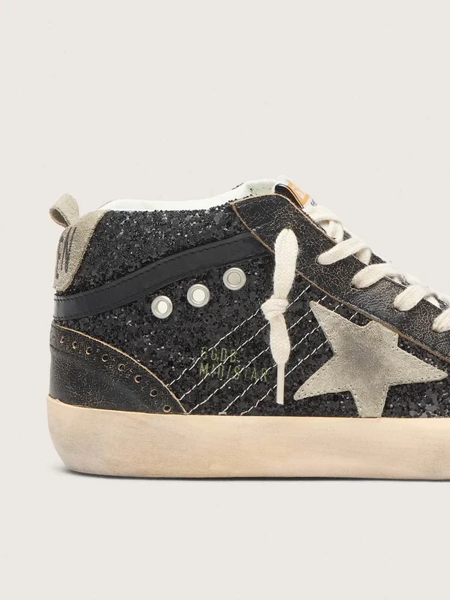 Mid Star für Damen in schwarzem Glitzer mit taubengrauem Stern aus Wildleder und Fersenlasche