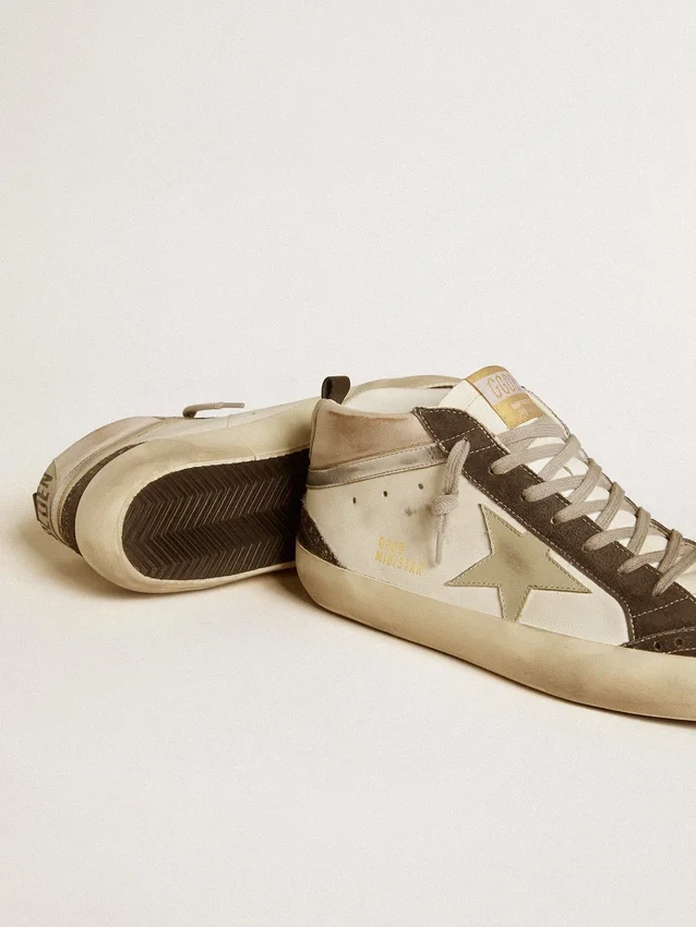 Mid Star mit grauem Lederstern und metallisch-silbernem Lederakzent