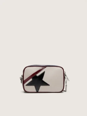 Mini Star Bag aus butterweissem Leder mit schwarzem Stern und burgunderroten sowie dunkelblauen Details