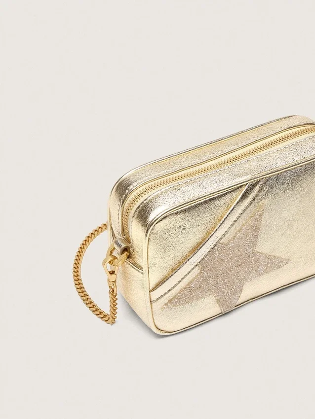 Mini Star Bag aus platinfarbenem Leder mit Swarovski-Stern