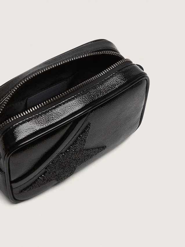 Mini Star Bag aus schwarzem Leder mit Swarovski-Kristallstern