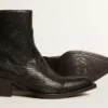 Niedrige Debbie-Stiefel aus schwarzem Leder mit Schlangenprint