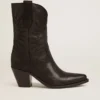 Niedrige Wish Star-Stiefel aus schwarzem Leder mit Ton-in-Ton-eingearbeiteter Sternverzierung