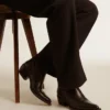 Niedrige Wish Star-Stiefel aus schwarzem Leder mit Ton-in-Ton-eingearbeiteter Sternverzierung