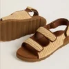 Noa Young Sandalen aus beigem Raffia und braunem Leder