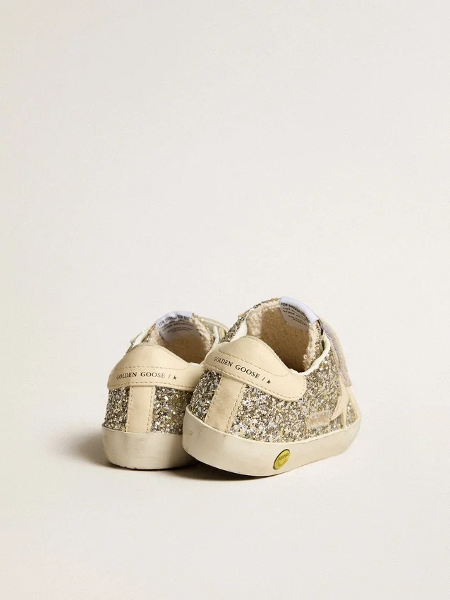 Old School Junior in Platin-Glitzer mit Lederstern und Fersenlasche