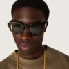 Panthos-Sonnenbrille im quadratischen Stil mit havannabraunem Rahmen und grünen Gläsern
