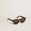 Panthos-Sonnenbrille im quadratischen Stil mit schwarzem Rahmen und schwarzen Gläsern