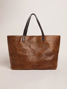 Pasadena-Tasche aus gehämmertem Leder mit Leopardenmuster und kontrastierenden schwarzen Griffen