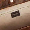 Pasadena-Tasche aus gehämmertem Leder mit Leopardenmuster und kontrastierenden schwarzen Griffen