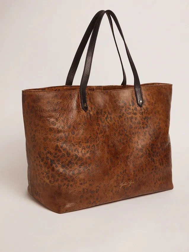 Pasadena-Tasche aus gehämmertem Leder mit Leopardenmuster und kontrastierenden schwarzen Griffen
