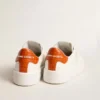 Purestar für Damen mit weissem Lederstern und orangefarbener Fersenlasche
