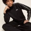 Schwarzes Damen-Sweatshirt mit Reissverschluss und weissen Sternen