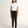Schwarze Leggings für Mädchen mit weissen Sternen an den Seiten
