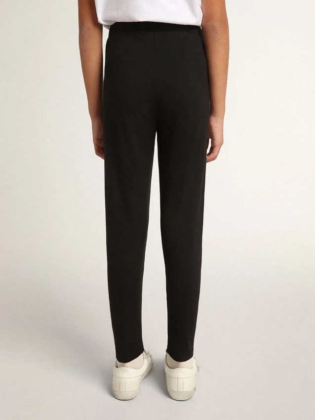 Schwarze Leggings für Mädchen mit weissen Sternen an den Seiten