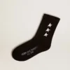 Schwarze Socken mit kontrastierenden weissen Sternen
