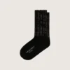 Schwarze Socken mit Used-Look-Details und Strasssteinen