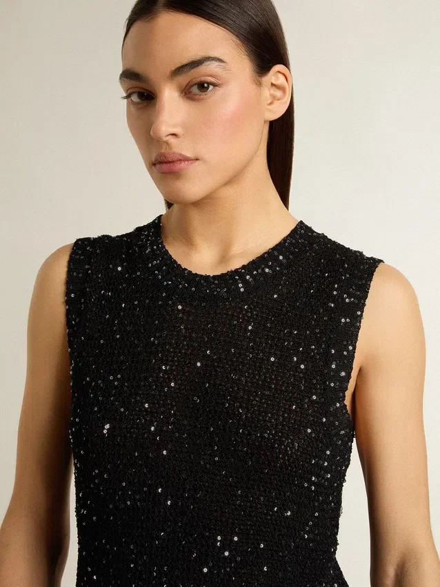 Schwarzes Mesh-Strickoberteil mit Pailletten und kontrastierenden Details
