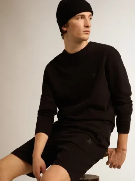 Schwarzes Sweatshirt aus der Archibald Star Collection mit Ton-in-Ton-Stern auf der Vorderseite