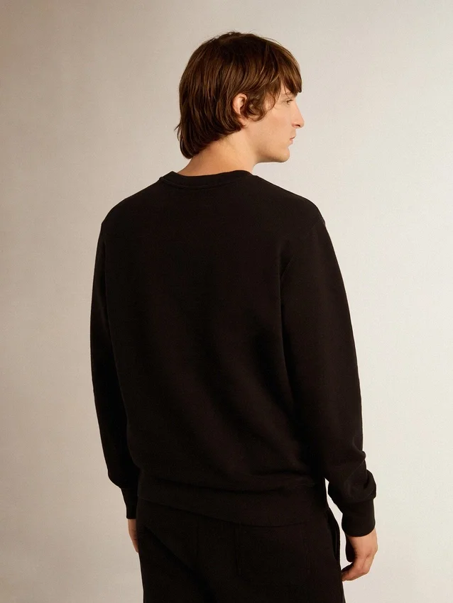 Schwarzes Sweatshirt aus der Archibald Star Collection mit Ton-in-Ton-Stern auf der Vorderseite