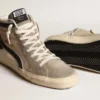 Slide aus beigem Mesh und Nylon mit blauem Lederstern und Zierstreifen