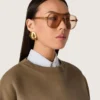 Sonnenbrille im Aviator-Stil mit honigfarbenem Rahmen und Gläsern