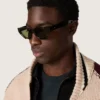 Sonnenbrille im rechteckigen Stil mit havannabraunem Rahmen