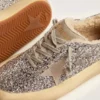 Space-Star-Schuhe für Frauen in silbernem Glitzer mit Lammfellfutter
