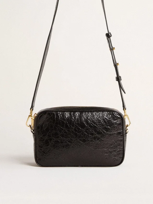 Star Bag aus glänzendem schwarzem Leder mit Ton-in-Ton-Stern