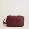 Star Bag aus weinrotem Leder mit Ton-in-Ton-Stern