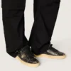 Stardan für Herren aus schwarzem Leder mit schwarzem Lederstern und Fersenlasche