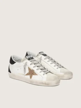 Super-Star für Damen aus Nappaleder mit goldenem Glitzerstern und schwarzer Glitzer-Fersenlasche