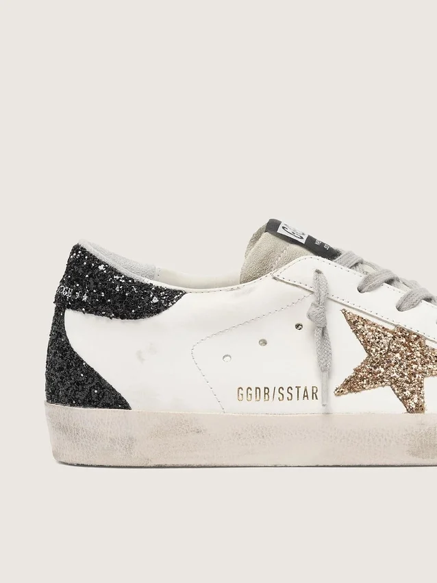 Super-Star für Damen aus Nappaleder mit goldenem Glitzerstern und schwarzer Glitzer-Fersenlasche