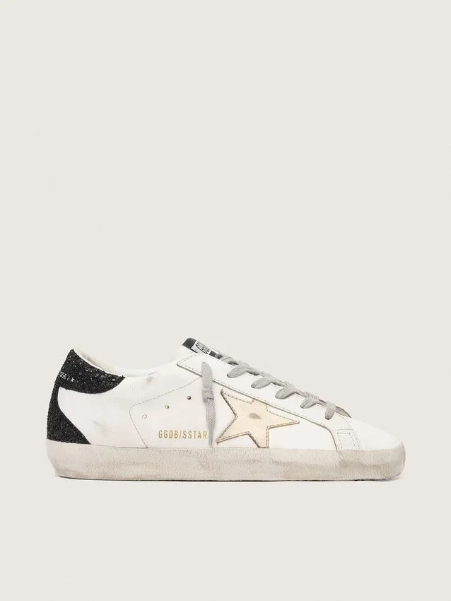 Super-Star für Damen mit goldenem Stern und schwarzer Glitzer-Fersenlasche