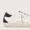 Super-Star für Damen mit goldenem Stern und schwarzer Glitzer-Fersenlasche